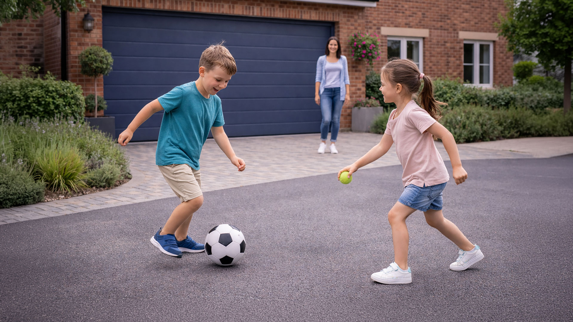 KIds Playing Football in front of Garage Door